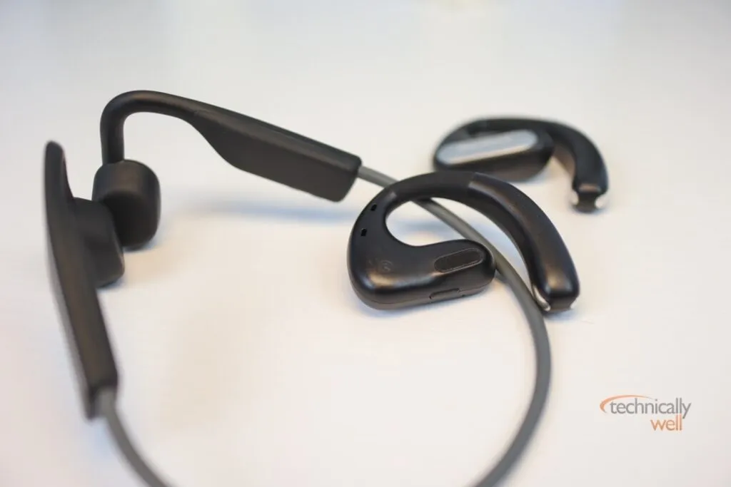 OpenRock Pro on top of the AfterShokz headphones