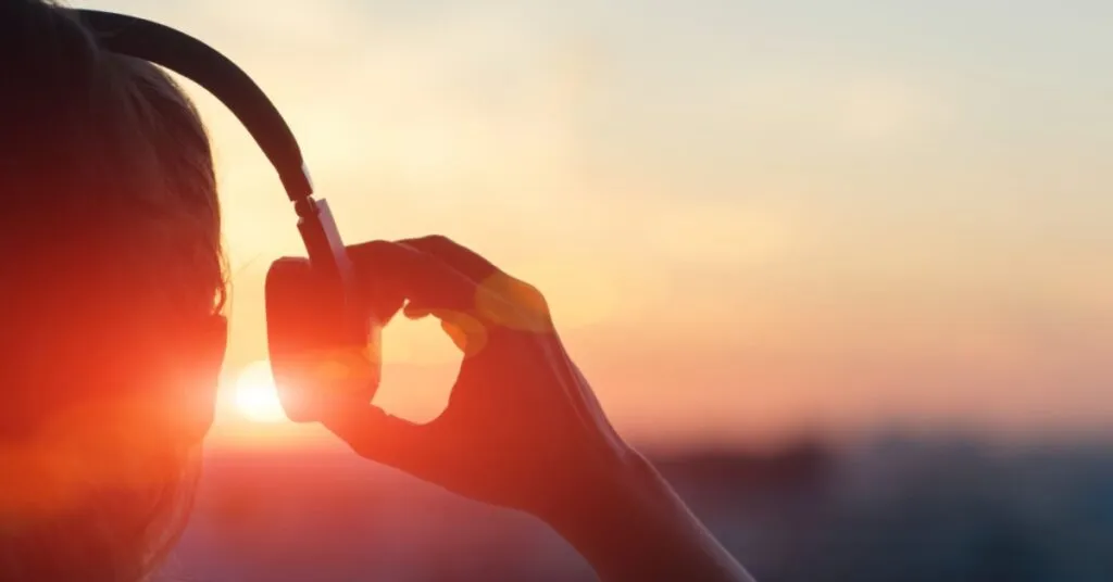 Listening to music on headphones in the summer